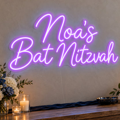 Personalised Bat Mitzvah Neon Sign in purple LED neon on clear acrylic, angled view