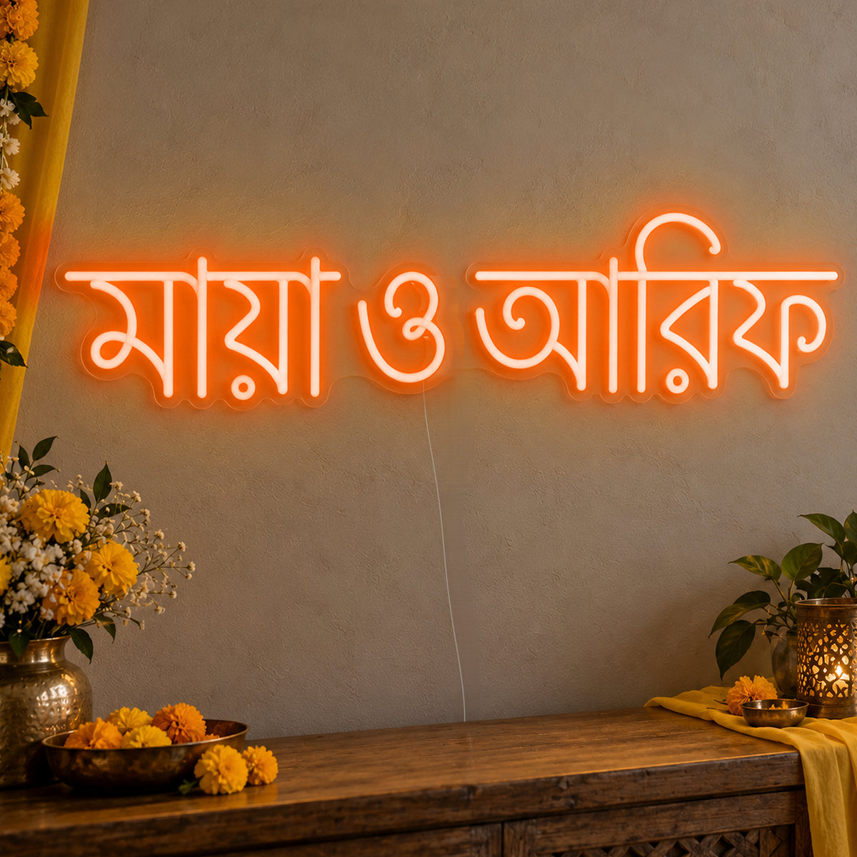 Personalised Bengali Couple Names Neon Sign in orange LED neon on clear acrylic, angled view