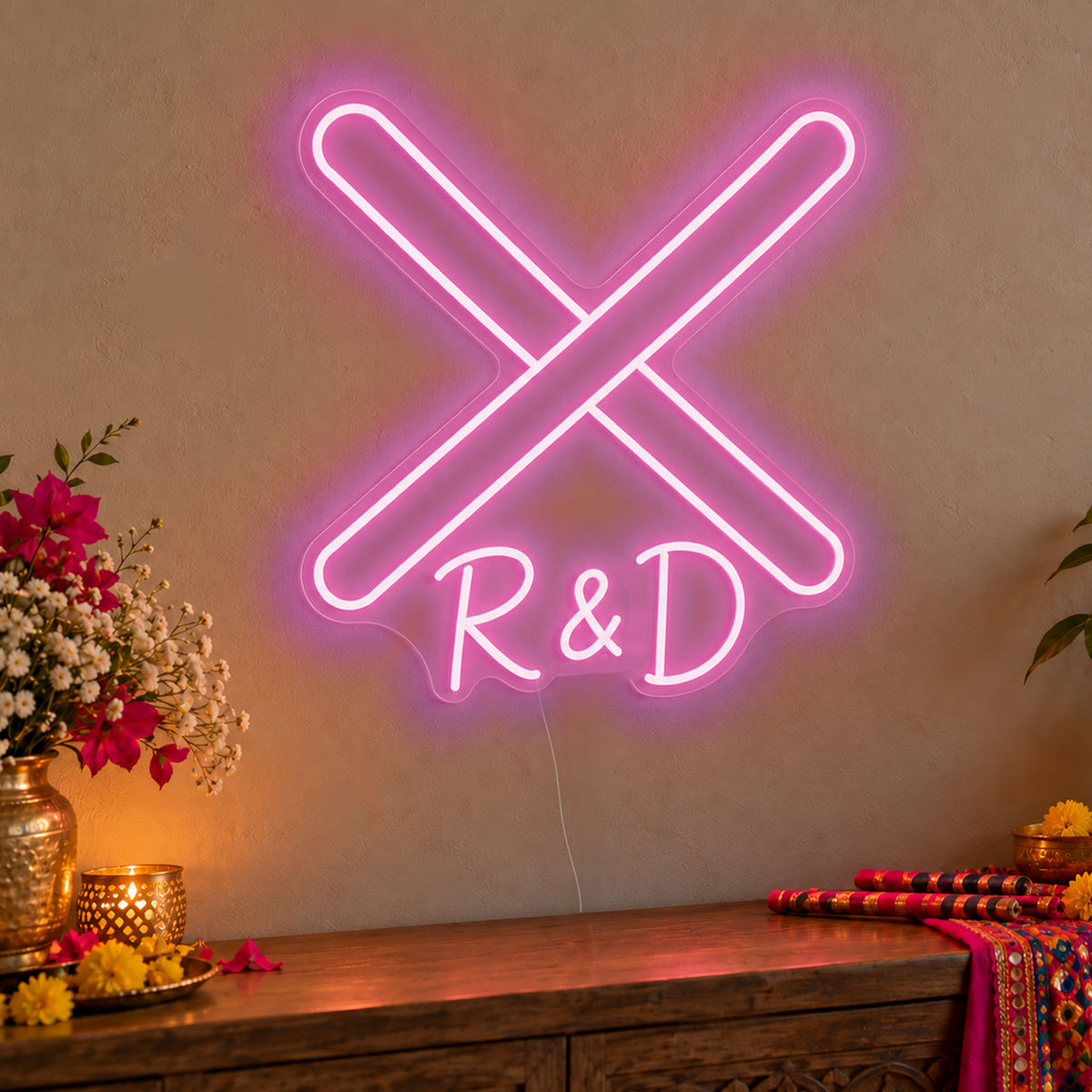 Personalised Dandiya Initials Neon Sign in pink LED neon on clear acrylic, angled view