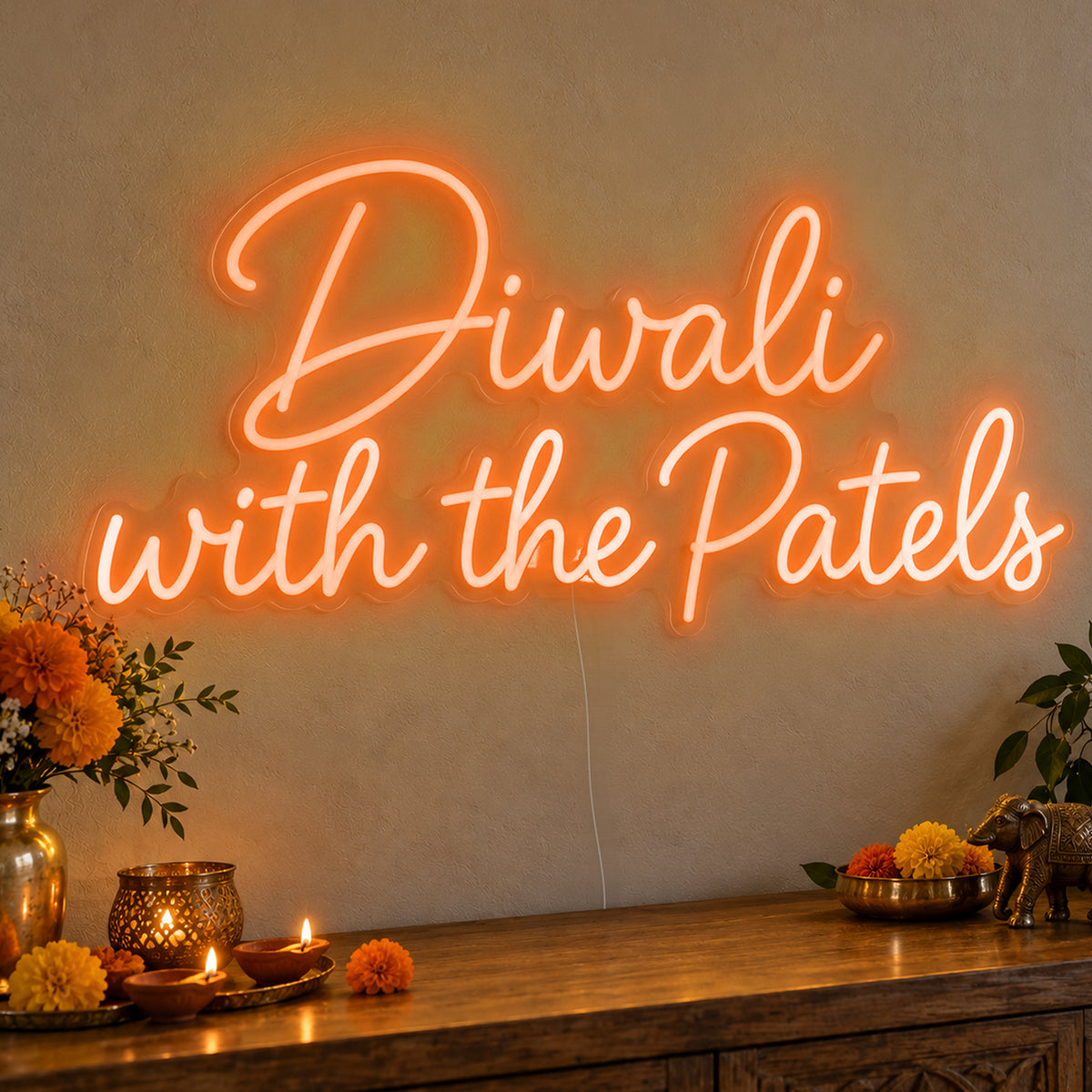 Personalised Family Diwali Neon Sign in orange LED neon on clear acrylic, angled view
