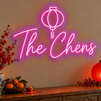 Personalised Family Lantern Neon Sign in pink LED neon on clear acrylic, angled view