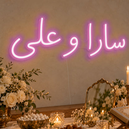 Personalised Farsi Couple Names Neon Sign in pink LED neon on clear acrylic, angled view