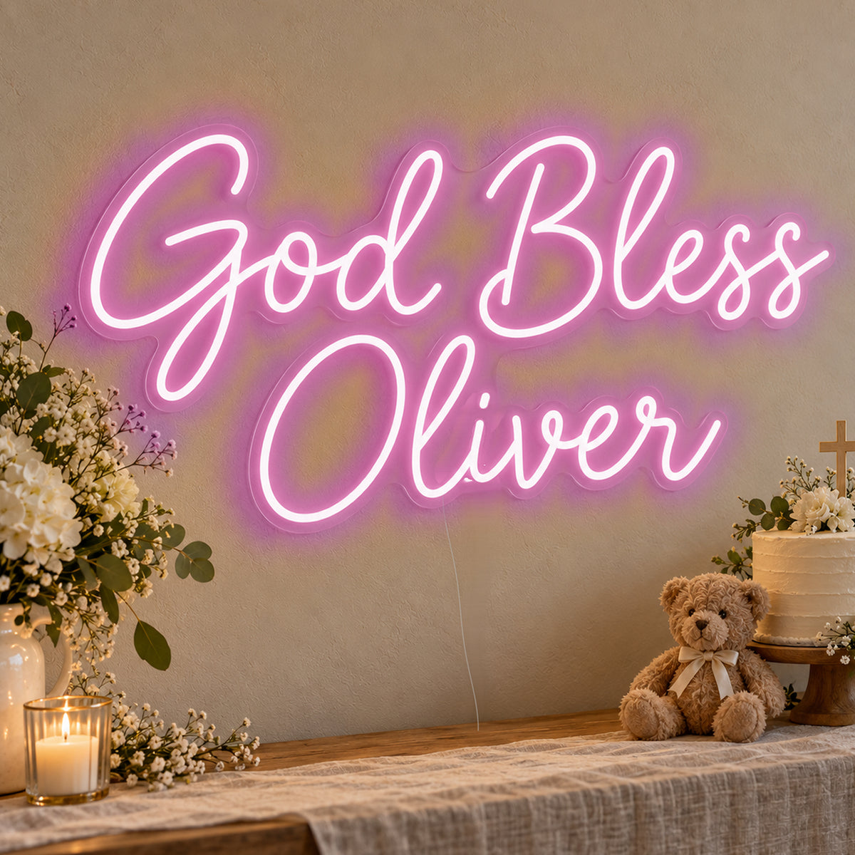 Personalised God Bless Neon Sign in pink LED neon on clear acrylic, angled view