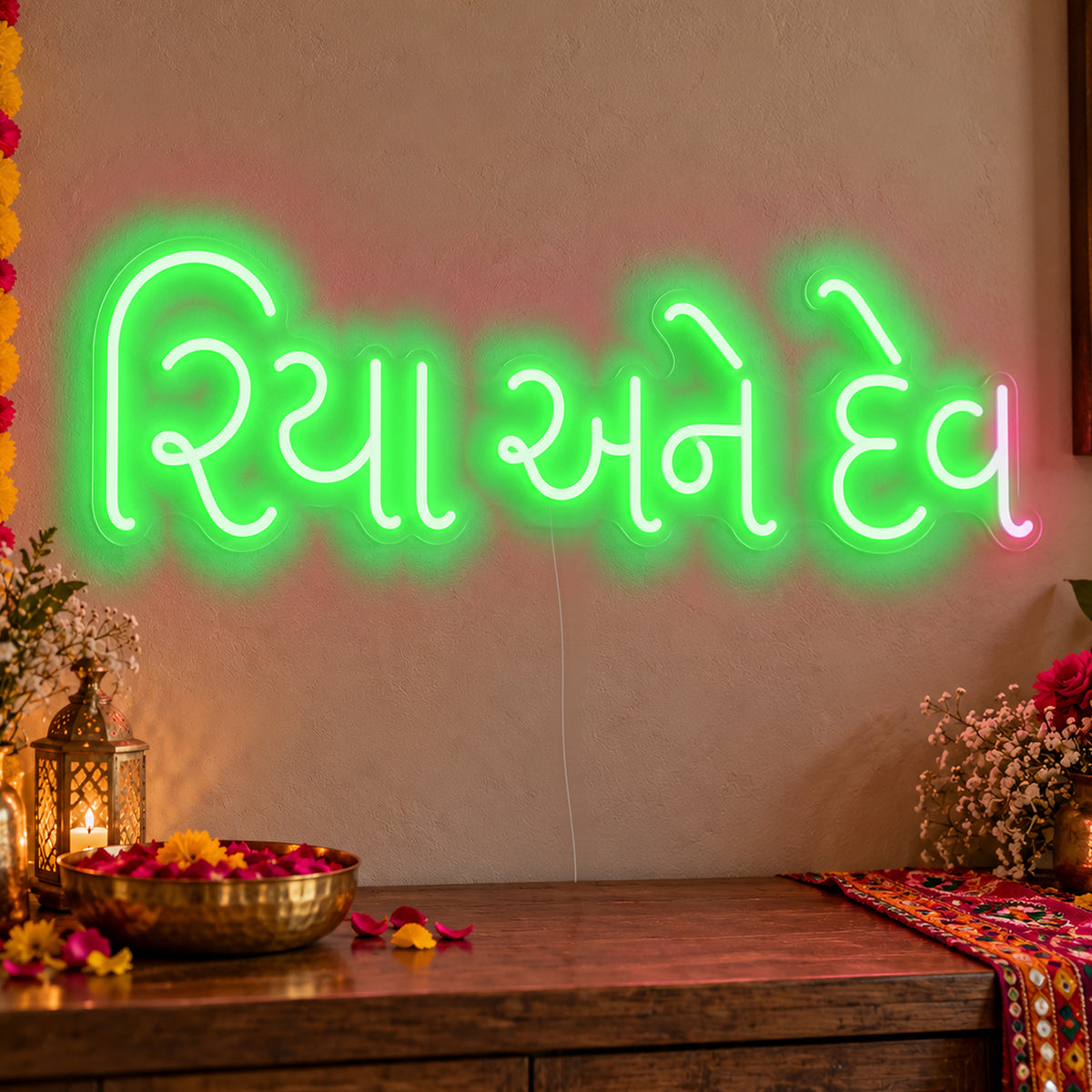 Personalised Gujarati Couple Names Neon Sign in green LED neon on clear acrylic, angled view