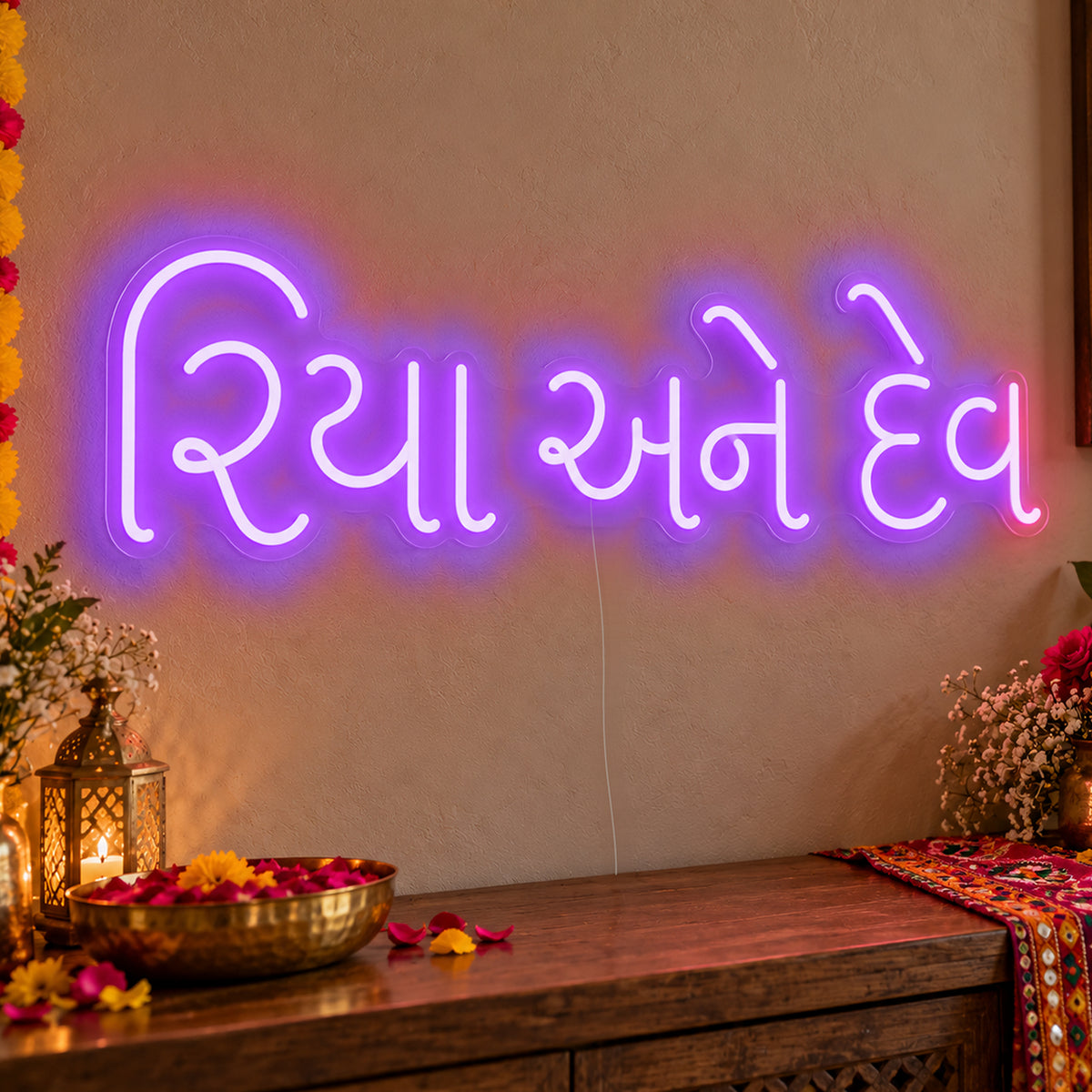 Personalised Gujarati Couple Names Neon Sign in purple LED neon on clear acrylic, angled view