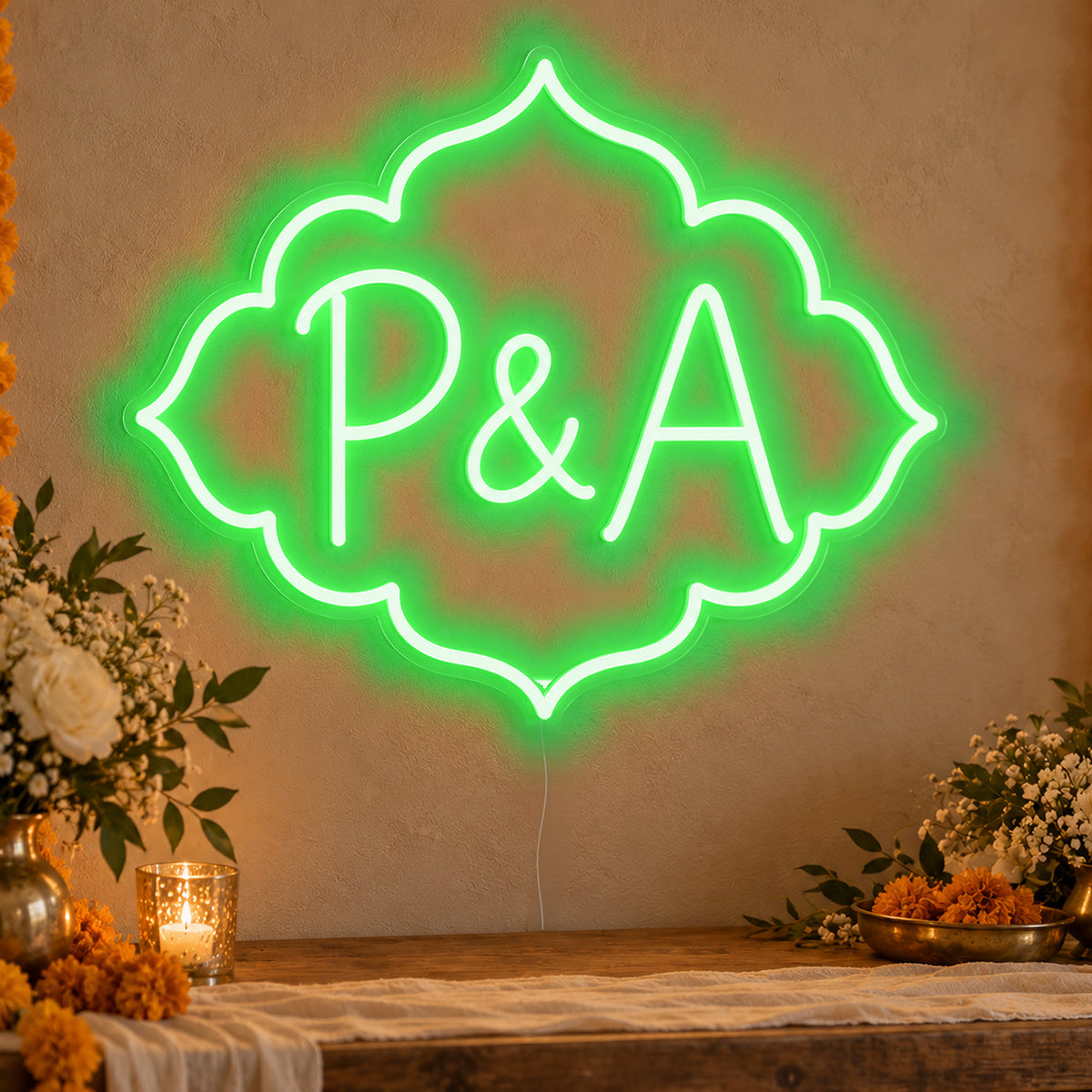 Personalised Marigold Initials Neon Sign in green LED neon on clear acrylic, angled view