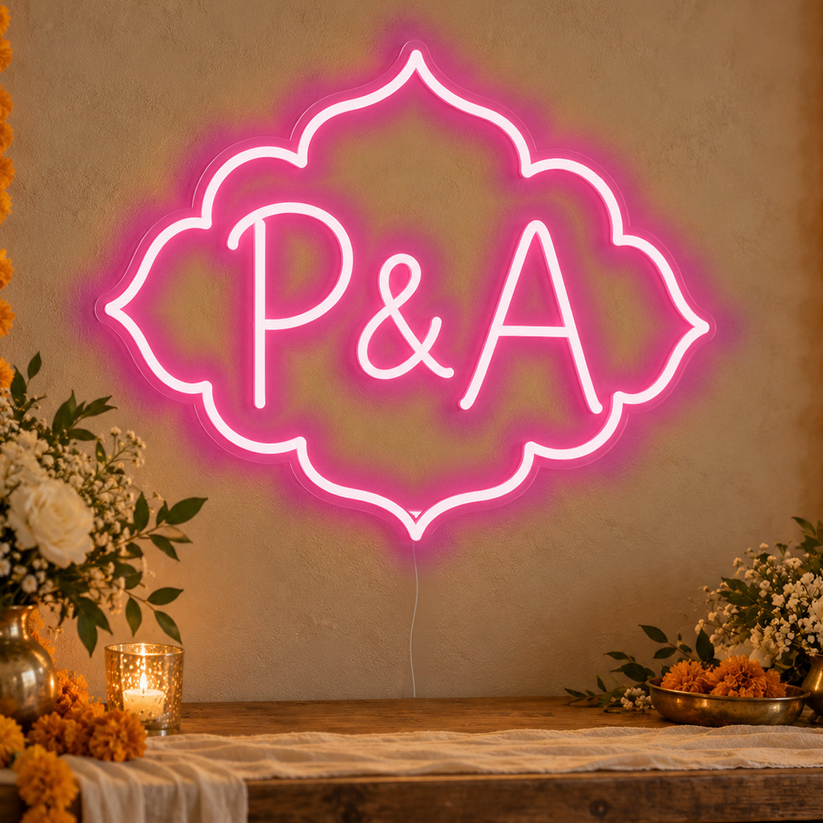 Personalised Marigold Initials Neon Sign in rose red LED neon on clear acrylic, angled view