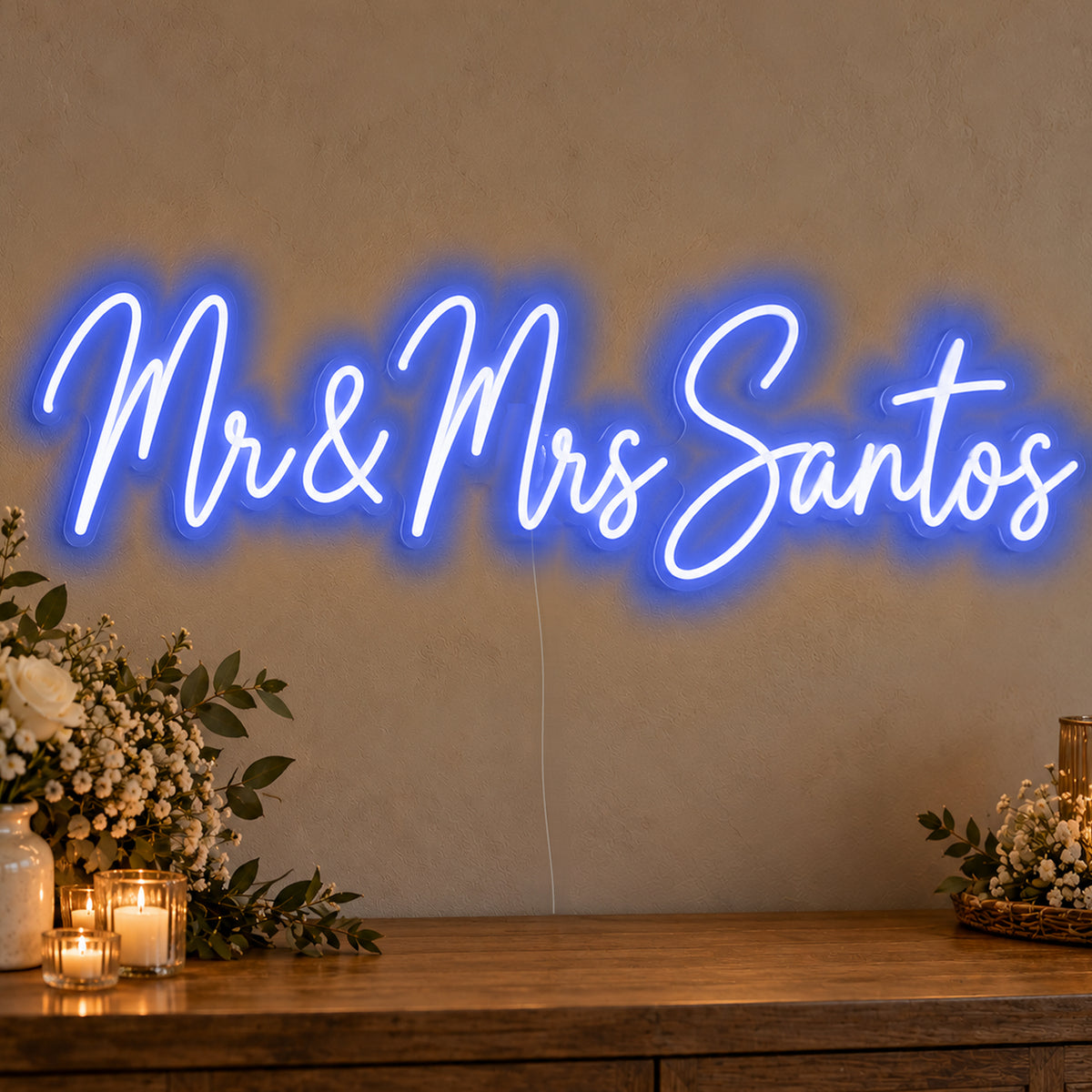 Personalised Mr & Mrs Surname Neon Sign in blue LED neon on clear acrylic, angled view
