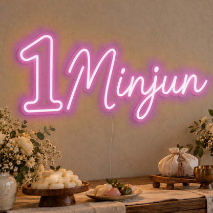 Personalised Name One Neon Sign in pink LED neon on clear acrylic, angled view