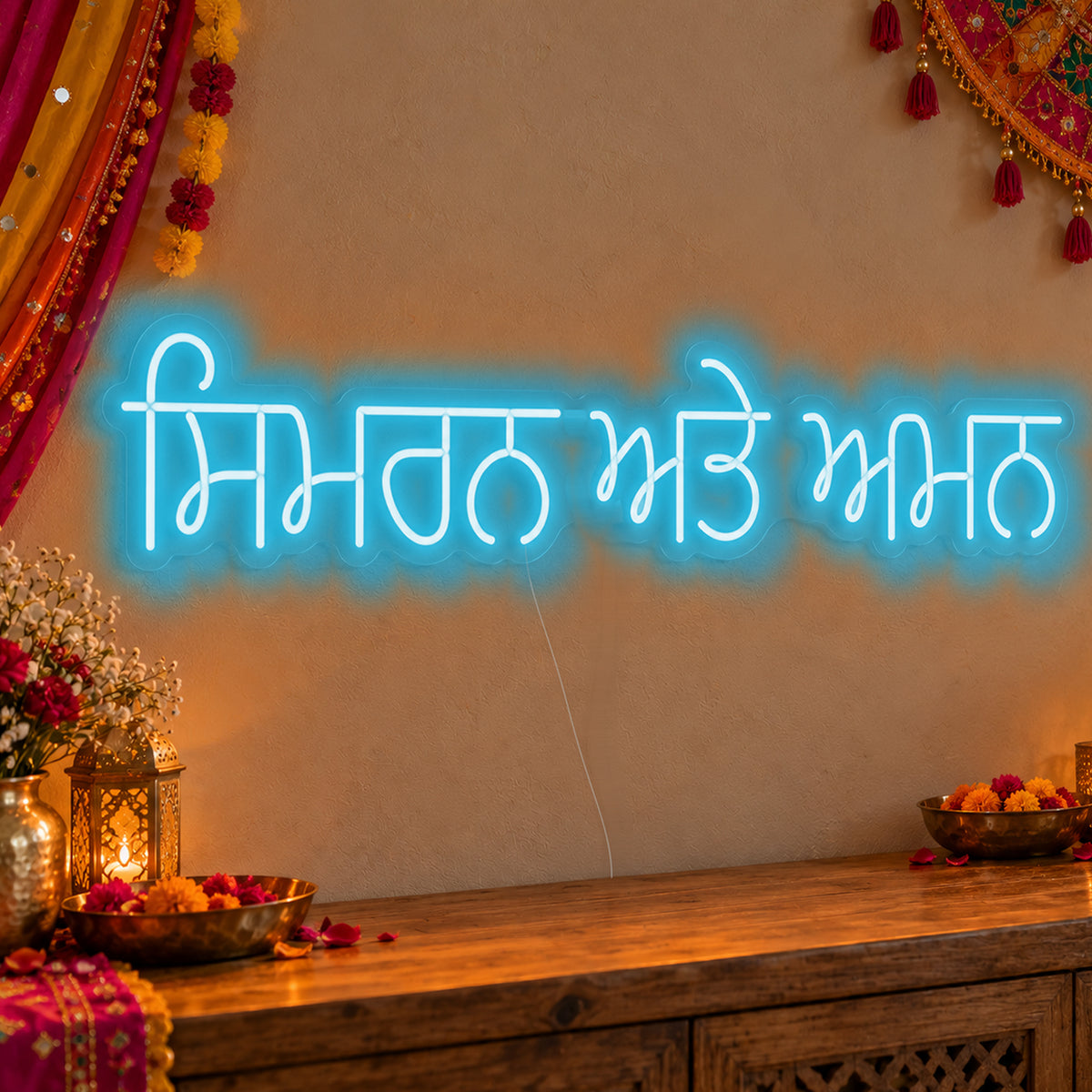 Personalised Punjabi Couple Names Neon Sign in ice blue LED neon on clear acrylic, angled view