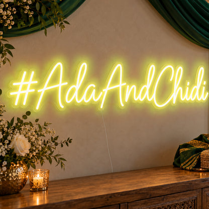 Personalised Wedding Hashtag Neon Sign in yellow LED neon on clear acrylic, angled view