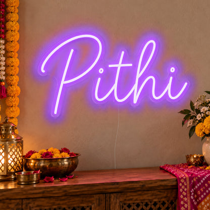 Pithi Neon Sign in purple LED neon on clear acrylic, angled view