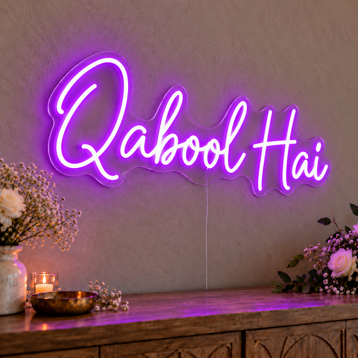 Qabool Hai Neon Sign in purple LED neon on clear acrylic, angled view