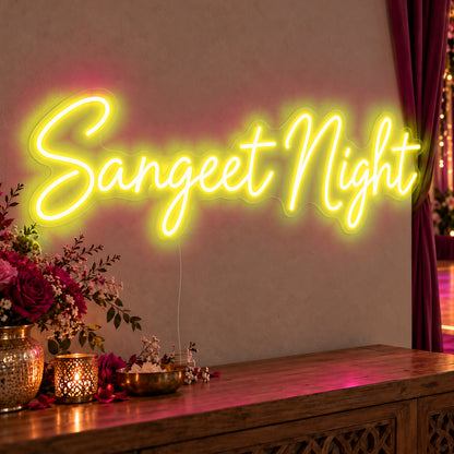 Sangeet Night Neon Sign in yellow LED neon on clear acrylic, angled view