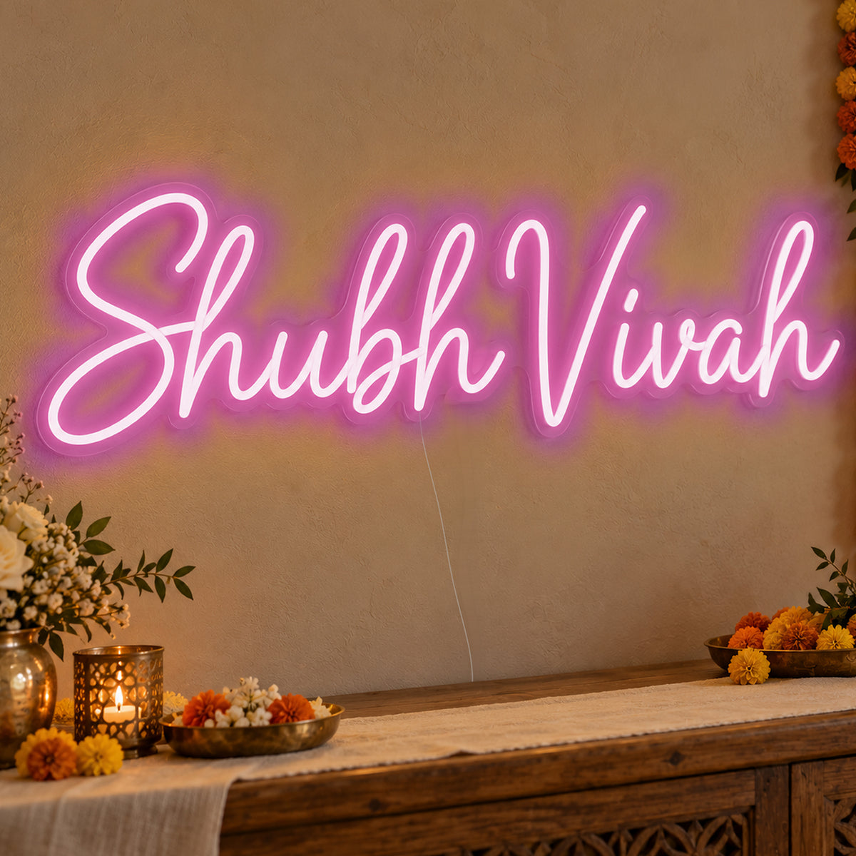 Shubh Vivah Neon Sign in pink LED neon on clear acrylic, angled view