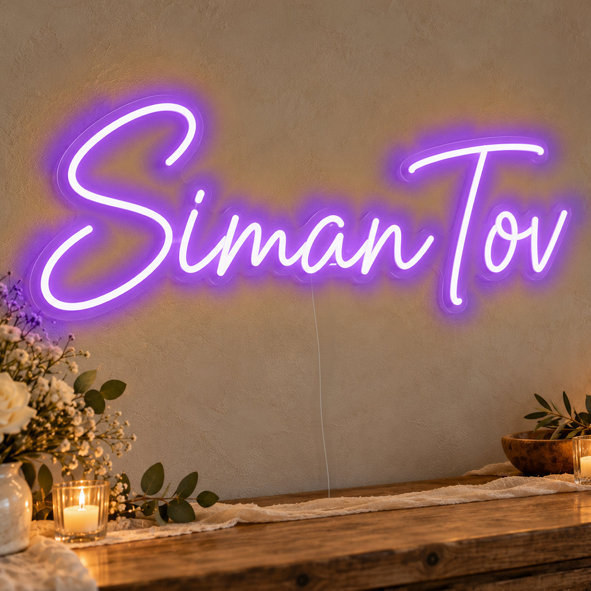 Siman Tov Neon Sign in purple LED neon on clear acrylic, angled view