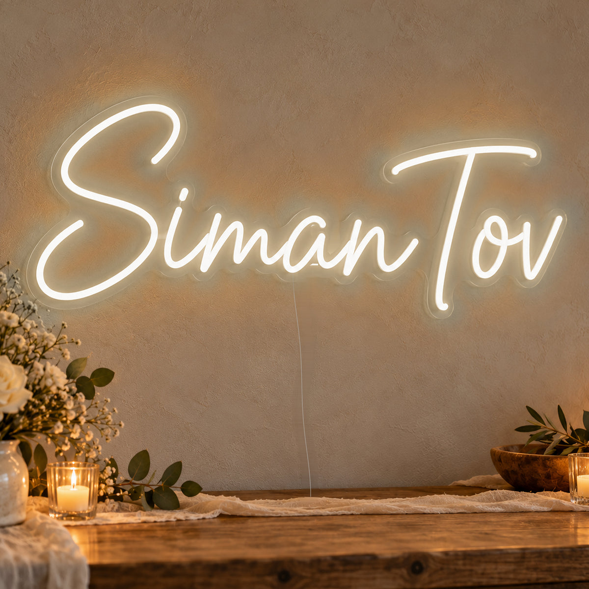 Siman Tov Neon Sign in warm white LED neon on clear acrylic, angled view