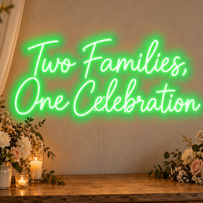 Two Families One Celebration Neon Sign in green LED neon on clear acrylic, angled view