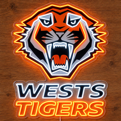 Wests Tigers Neon Sign, featuring illuminated team logo on a wooden surface.