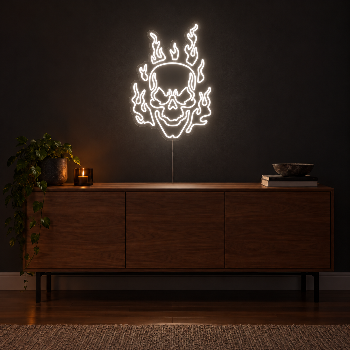 White Flaming Skull Neon Sign featuring a white skull surrounded by curling white flames, displayed on a dark wall above a wooden sideboard.