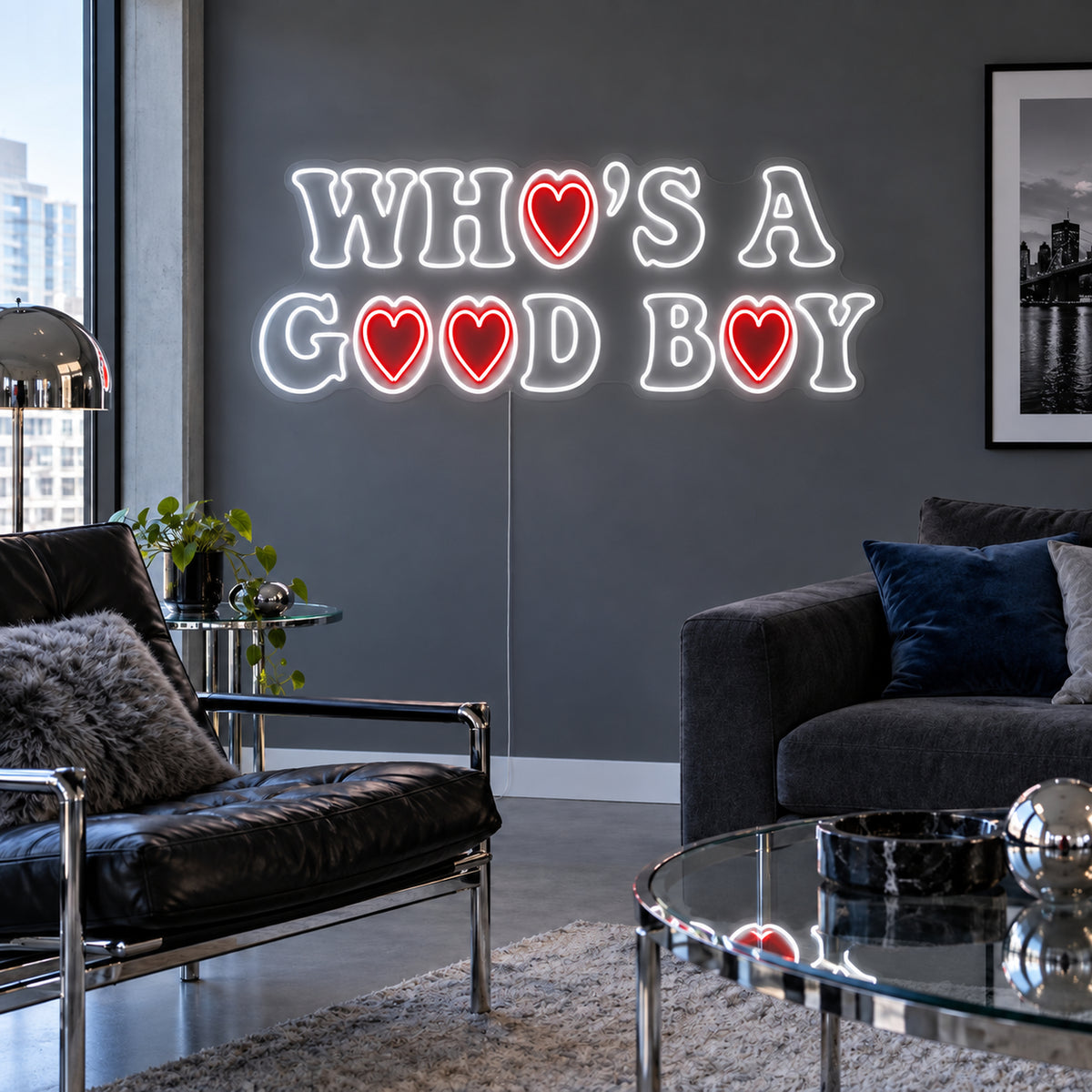 Who's A Good Boy Neon Sign with white outlined lettering and red heart details on transparent acrylic, displayed on a living room wall